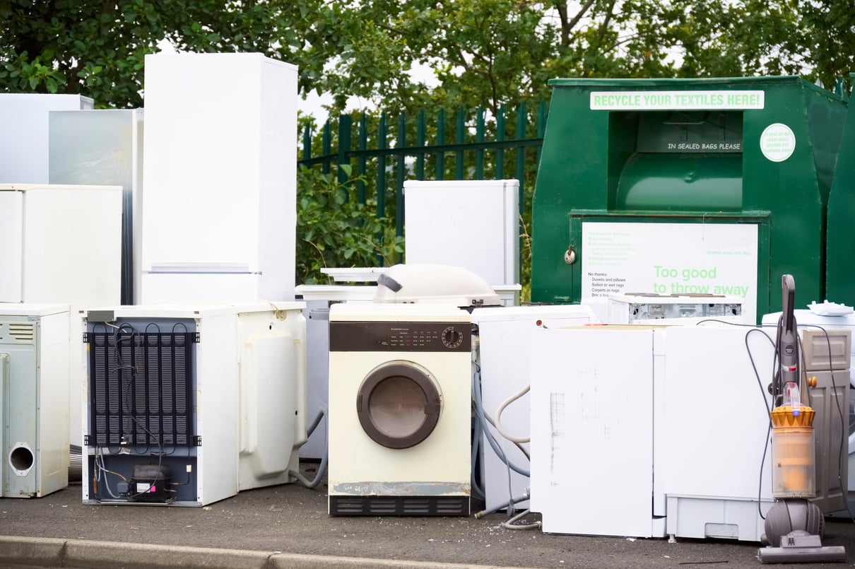 Old fridges freezers wash machines and kitchen appliances at rubbish dump